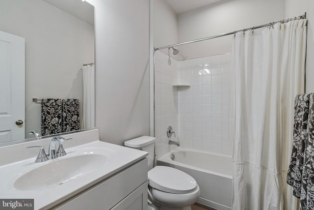 full bath with toilet, shower / bath combination with curtain, and vanity