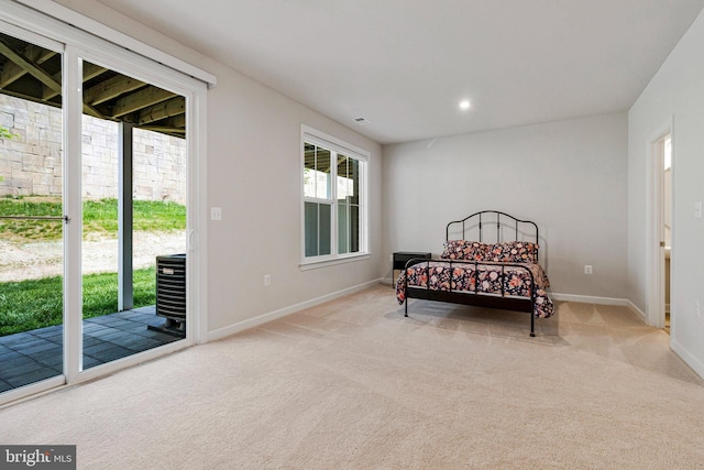 bedroom with access to outside, baseboards, carpet floors, and recessed lighting
