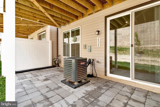 view of patio with central AC unit