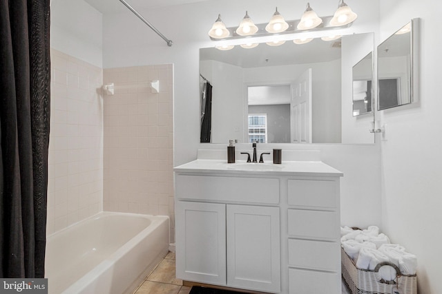 bathroom with bathtub / shower combination, tile patterned flooring, and vanity