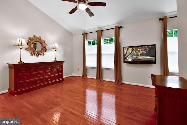 630 Brookedge Ct, Bowie, MD 20721 - bedroom featuring multiple windows, hardwood / wood-style flooring, vaulted ceiling, baseboards, and ceiling fan
