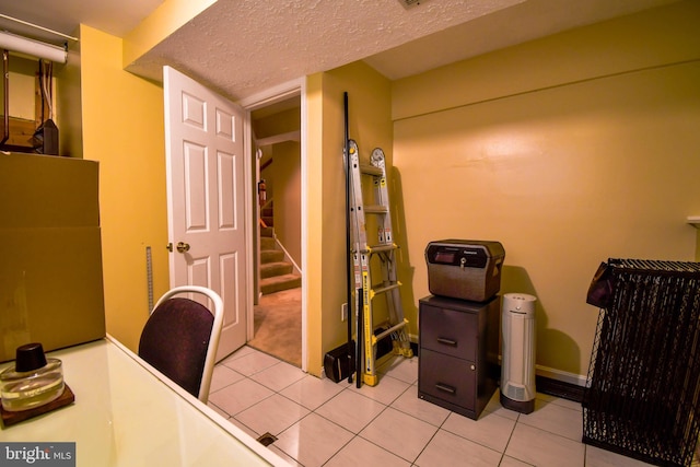 630 Brookedge Ct, Bowie, MD 20721 - office area featuring light tile patterned floors, a textured ceiling, and baseboards