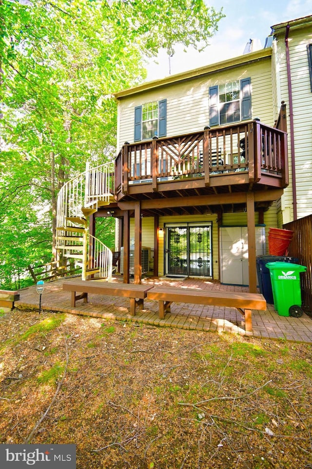 630 Brookedge Ct, Bowie, MD 20721 - back of property featuring a wooden deck and stairs