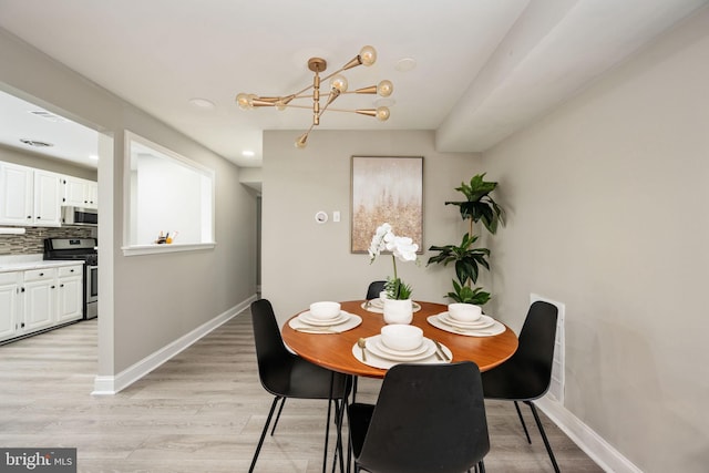 12705 Gordon Blvd Unit 37, Woodbridge, VA 22192 - dining area featuring a chandelier, light wood finished floors, and recessed lighting