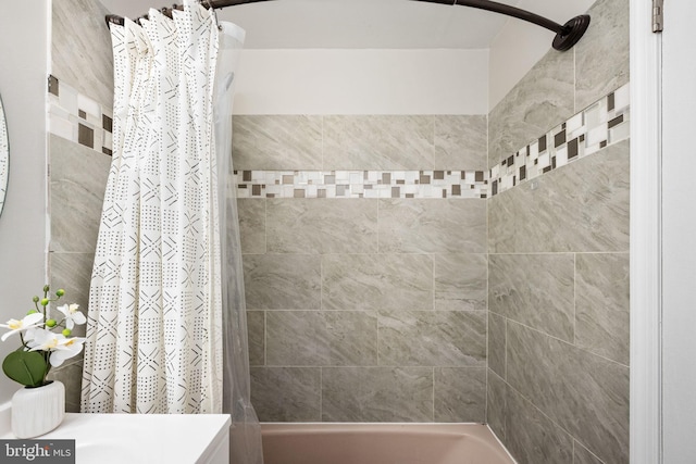 12705 Gordon Blvd Unit 37, Woodbridge, VA 22192 - bathroom featuring shower / bathtub combination with curtain and vanity