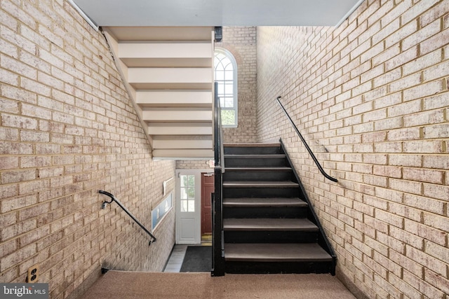 12705 Gordon Blvd Unit 37, Woodbridge, VA 22192 - stairway with plenty of natural light and brick wall
