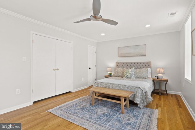 bedroom featuring baseboards, light wood-style floors, ornamental molding, recessed lighting, and a ceiling fan