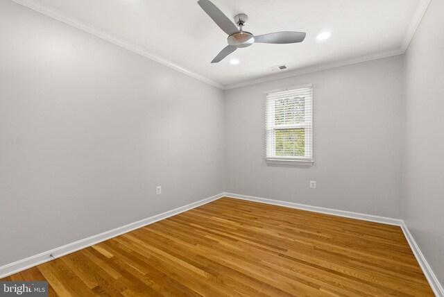 unfurnished room with light wood-style flooring, baseboards, a ceiling fan, crown molding, and recessed lighting
