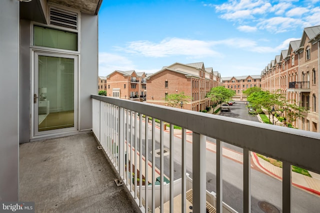 balcony featuring a residential view
