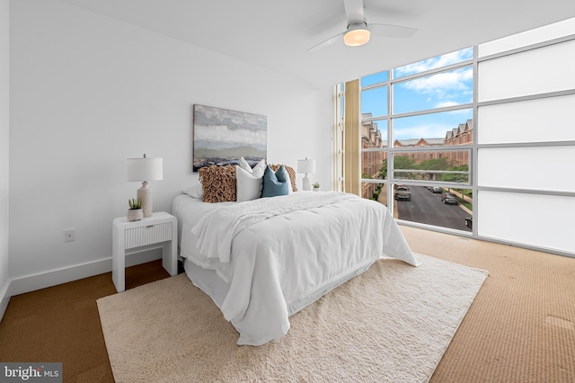 bedroom with carpet flooring and a ceiling fan