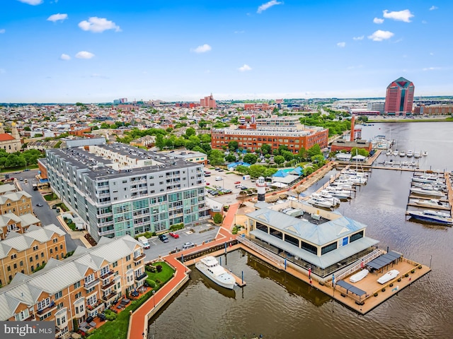 view of urban area with a large body of water