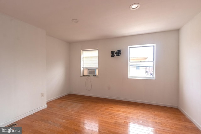 2106 S 12th St, Philadelphia, PA 19148 - empty room with light wood finished floors and baseboards