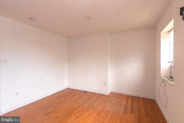 2106 S 12th St, Philadelphia, PA 19148 - unfurnished room featuring light wood-style flooring and baseboards