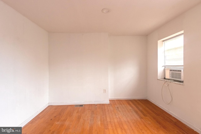 2106 S 12th St, Philadelphia, PA 19148 - unfurnished room with light wood-type flooring, cooling unit, and baseboards