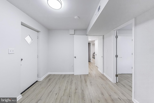 11408 Woodson Ave, Kensington, MD 20895 - unfurnished room with wood finished floors, baseboards, and a smoke detector