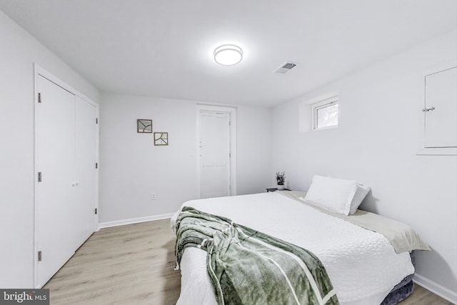 11408 Woodson Ave, Kensington, MD 20895 - bedroom featuring light wood-type flooring and baseboards