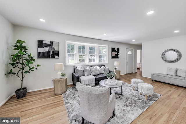 11408 Woodson Ave, Kensington, MD 20895 - living room with wood finished floors, recessed lighting, and baseboards