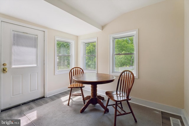 1127 Pawlings Rd, Norristown, PA 19403 - dining area with healthy amount of natural light, lofted ceiling, baseboards, and wood finished floors