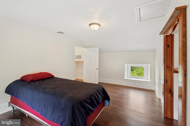 1127 Pawlings Rd, Norristown, PA 19403 - bedroom with baseboards, dark wood-type flooring, and attic access