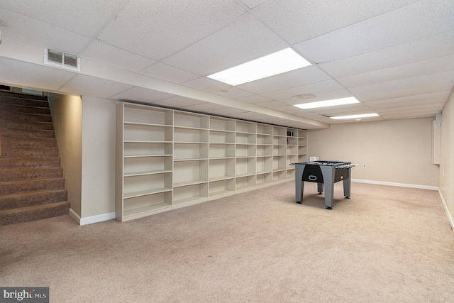 rec room with carpet and baseboards