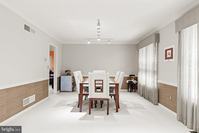 72 Leearden Rd, Hershey, PA 17033 - carpeted dining area with crown molding and rail lighting