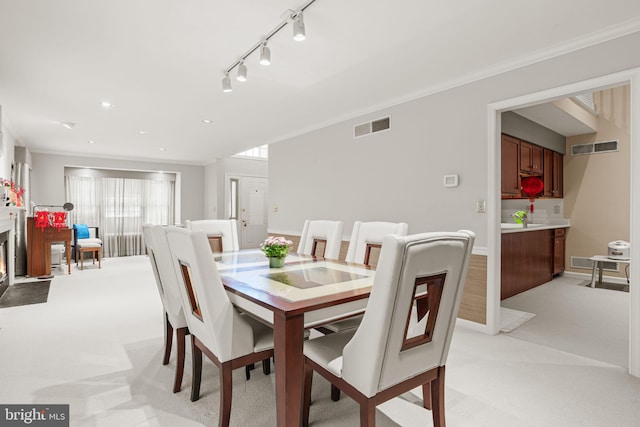 72 Leearden Rd, Hershey, PA 17033 - dining room featuring light carpet, ornamental molding, rail lighting, and recessed lighting