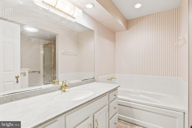 72 Leearden Rd, Hershey, PA 17033 - bathroom featuring wallpapered walls, a bath, vanity, a shower stall, and recessed lighting