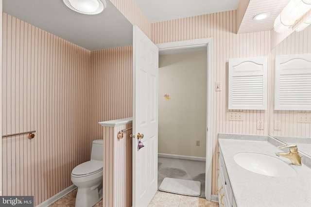 72 Leearden Rd, Hershey, PA 17033 - bathroom featuring wallpapered walls, toilet, vanity, tile patterned flooring, and baseboards