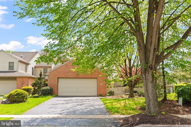 72 Leearden Rd, Hershey, PA 17033 - view of front of property with brick siding, driveway, and an attached garage