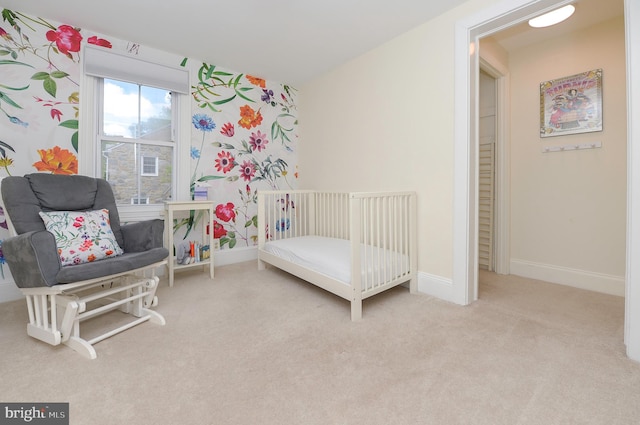 bedroom with carpet flooring and baseboards