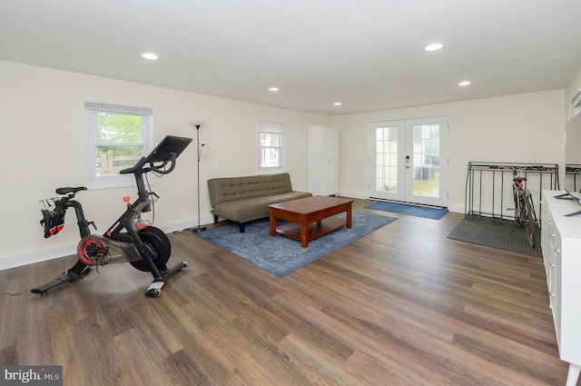 workout room with french doors, wood finished floors, recessed lighting, and baseboards