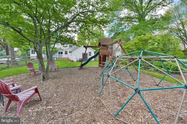 view of play area featuring fence