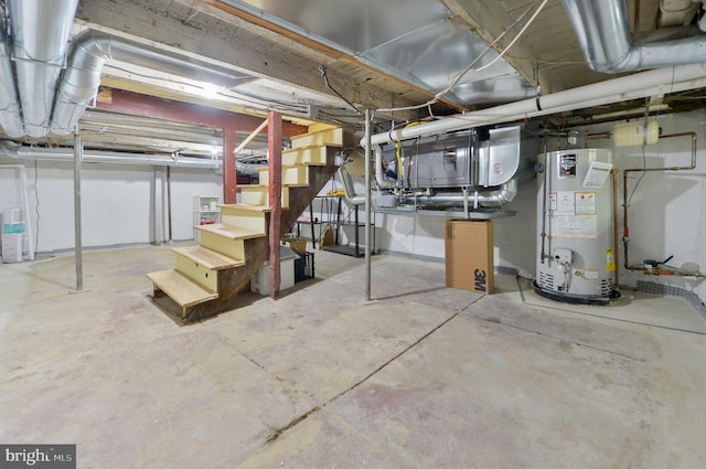 unfinished below grade area with gas water heater and stairway