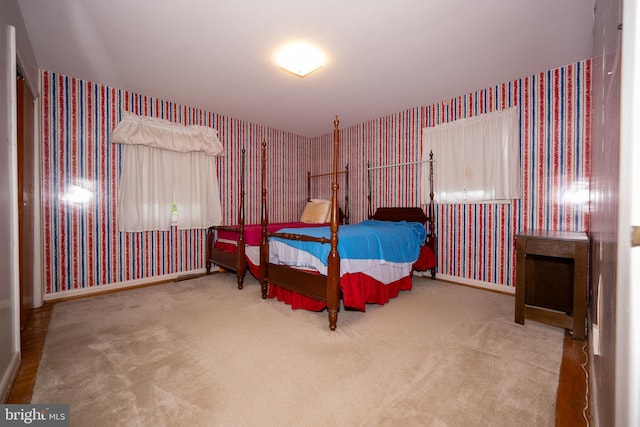 402 Old Courthouse Rd NE, Vienna, VA 22180 - bedroom featuring wallpapered walls, carpet, and baseboards