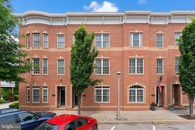 1338 Lowman St, Baltimore, MD 21230 - view of property featuring uncovered parking