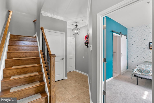 1338 Lowman St, Baltimore, MD 21230 - staircase featuring a barn door and baseboards