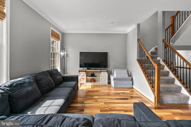 1338 Lowman St, Baltimore, MD 21230 - living room with wood finished floors, stairway, crown molding, and baseboards