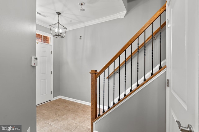 1338 Lowman St, Baltimore, MD 21230 - foyer featuring ornamental molding, a chandelier, stairway, and light tile patterned floors