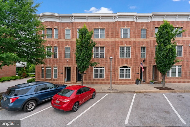 1338 Lowman St, Baltimore, MD 21230 - view of property featuring uncovered parking