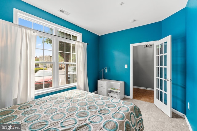 1338 Lowman St, Baltimore, MD 21230 - carpeted bedroom featuring baseboards