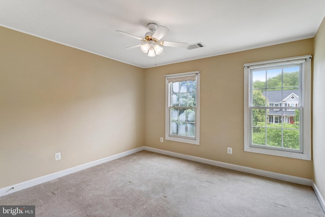 16028 Kings Mountain Rd, Woodbridge, VA 22191 - carpeted empty room with healthy amount of natural light, baseboards, a ceiling fan, and crown molding