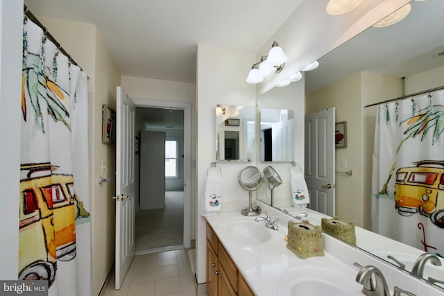 8931 Kiger St, Lorton, VA 22079 - full bath with tile patterned flooring and double vanity