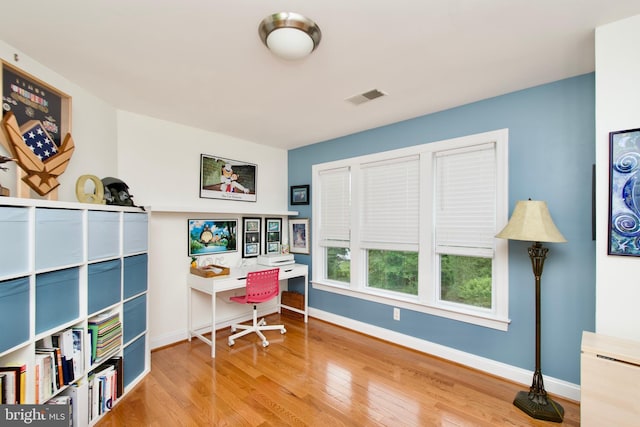 8931 Kiger St, Lorton, VA 22079 - home office with wood finished floors and baseboards
