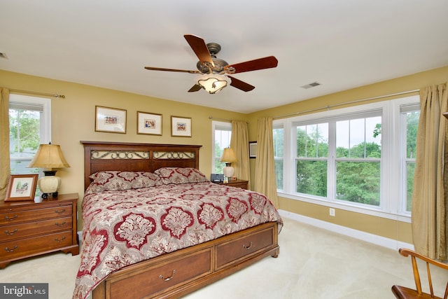 8931 Kiger St, Lorton, VA 22079 - bedroom featuring light colored carpet, baseboards, and ceiling fan