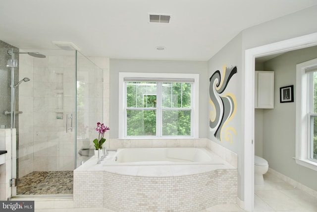 8931 Kiger St, Lorton, VA 22079 - full bath with a bath, a shower stall, toilet, and tile patterned flooring