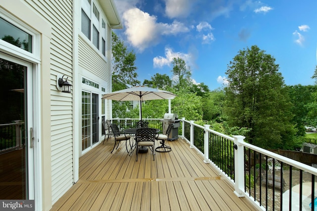 8931 Kiger St, Lorton, VA 22079 - wooden terrace featuring outdoor dining space and a grill