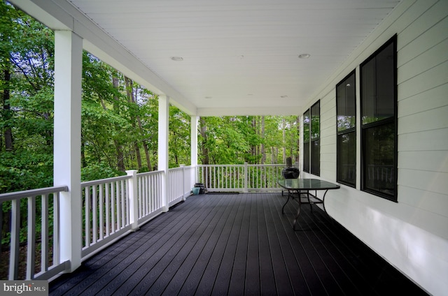 23883 Ebony Eyes Ct, Aldie, VA 20105 - wooden deck with a porch