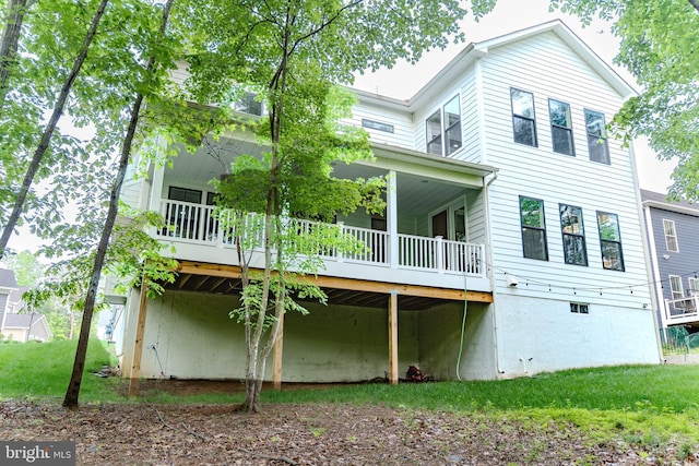 23883 Ebony Eyes Ct, Aldie, VA 20105 - rear view of house with a wooden deck