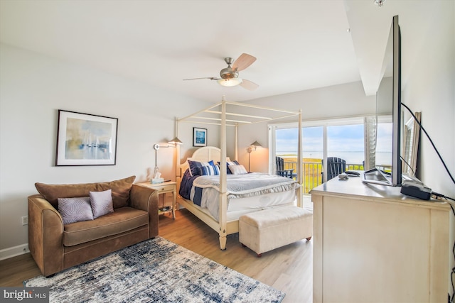 105 56th Unit 210P1, Ocean City, MD 21842 - bedroom with light wood-style floors, access to exterior, and ceiling fan