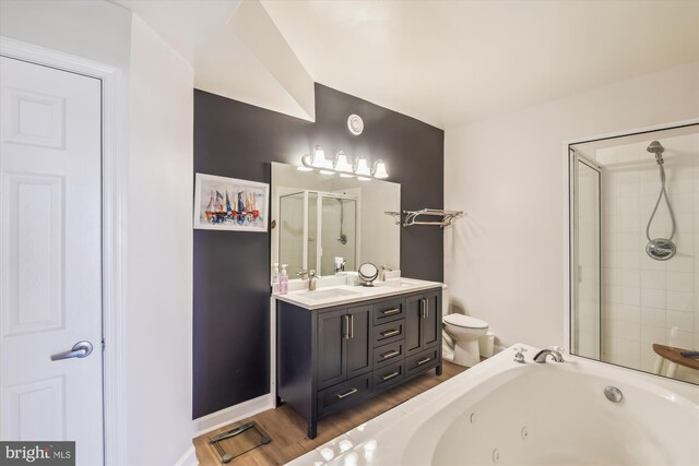 105 56th Unit 210P1, Ocean City, MD 21842 - bathroom with a shower stall, a tub with jets, toilet, double vanity, and wood finished floors